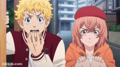 A Boy And A Girl Are Standing Next To Each Other And The Girl Is Wearing A Beret GIF