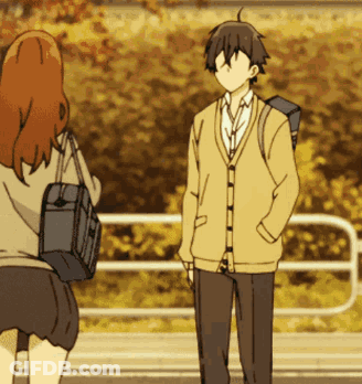Boy And Girl Standing Next To Each Other GIF