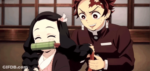 A Boy And A Girl Are Standing Next To Each Other In A Room GIF