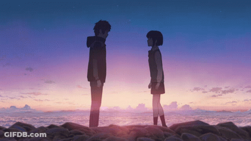 A Boy And A Girl Are Standing Next To Each Other In Front Of A Purple Sky GIF