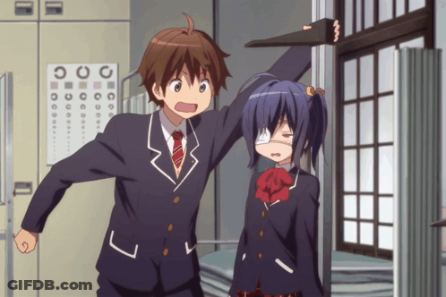 A Boy And A Girl Are Standing Next To Each Other In Front Of A Sign That Says " O " GIF