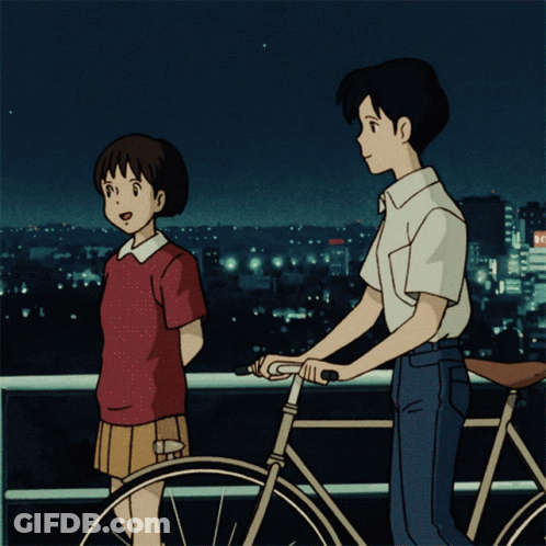 A Boy And A Girl Are Standing Next To Each Other On A Balcony With A Bicycle In The Foreground GIF