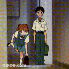 Boy And Girl Standing Next To Each Other GIF