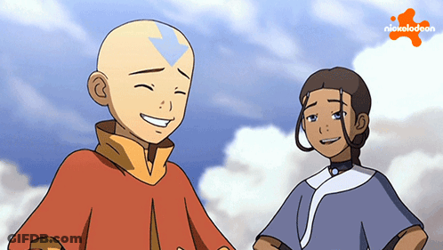 A Boy And A Girl Are Standing Next To Each Other With A Nickelodeon Logo Behind Them GIF