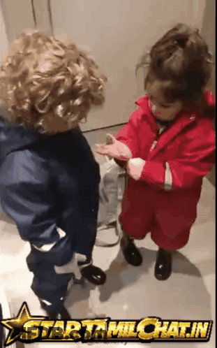 A Boy And A Girl Are Standing Next To Each Other With A Star That Says Startamilchat.in GIF
