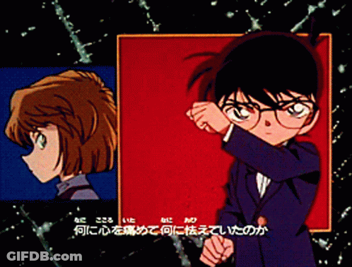 A Boy And A Girl Are Standing Next To Each Other With Foreign Writing On The Bottom GIF