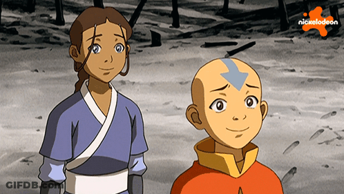A Boy And A Girl Are Standing Next To Each Other With The Nickelodeon Logo In The Background GIF