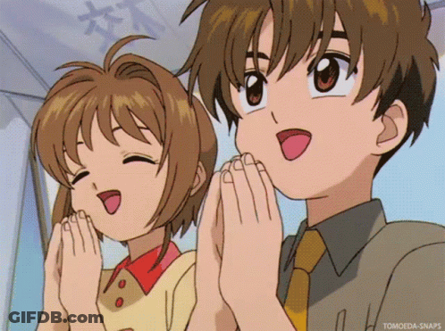A Boy And A Girl Are Standing Next To Each Other With Their Hands Folded In Prayer GIF