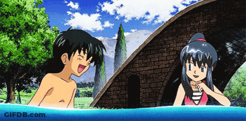 A Boy And A Girl Are Swimming In The Water And Laughing GIF