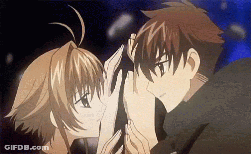 A Boy And A Girl Are Touching Each Other 'S Faces In An Anime Scene . GIF