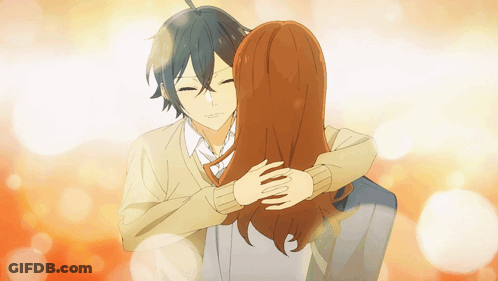 A Boy And A Girl Hugging Each Other With The Girl 'S Eyes Closed GIF