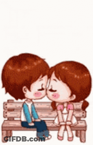 A Boy And A Girl Kissing While Sitting On A Bench GIF