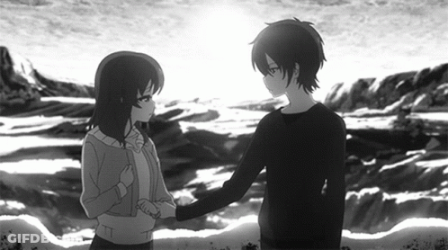 A Boy And A Girl Shaking Hands In Front Of The Ocean GIF