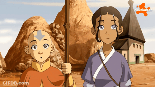 A Boy And A Girl Standing Next To Each Other With A Nickelodeon Logo Behind Them GIF