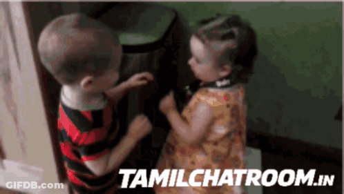 A Boy And A Girl Standing Next To Each Other With Tamilchatroom.in Written On The Bottom Right GIF
