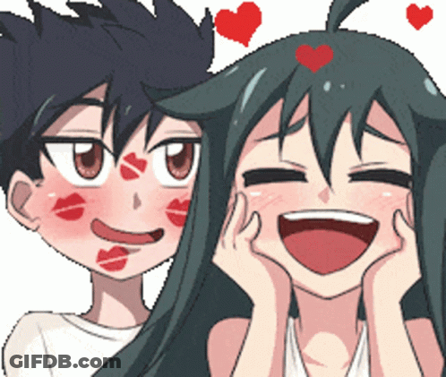 A Boy And A Girl With Red Kisses On Their Face GIF