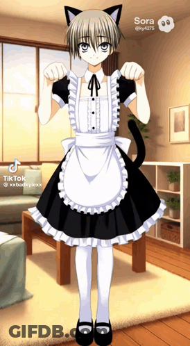 A Boy Dressed In A Maid Outfit With Cat Ears GIF