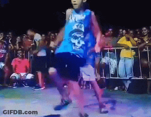 A Boy In A Blue Tank Top With A Skull On It Dancing In Front Of A Crowd GIF