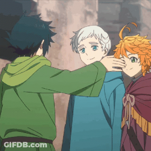 A Boy In A Green Hoodie Is Hugging Another Boy In A Blue Shirt GIF