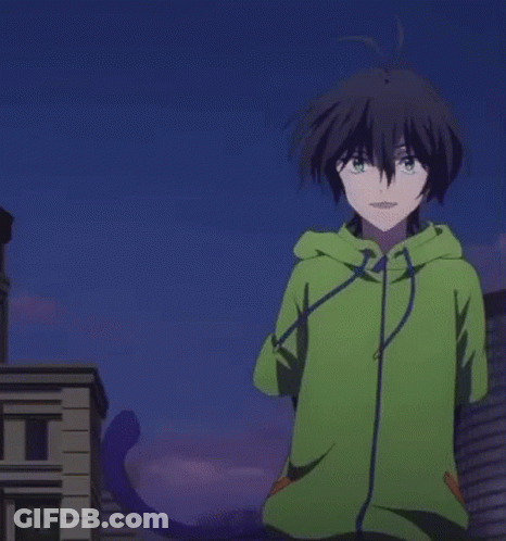 A Boy In A Green Hoodie Is Standing In Front Of A Blue Sky GIF