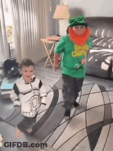 A Boy In A Green Shirt That Says Lucky Charms On It GIF