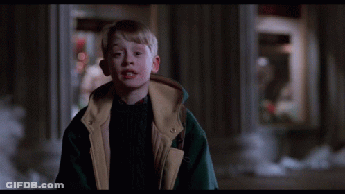 A Boy In A Jacket With The Words Sssmile On The Bottom Right GIF