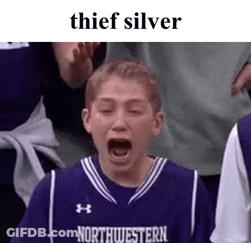 A Boy In A Purple Northwestern Jersey Is Screaming GIF