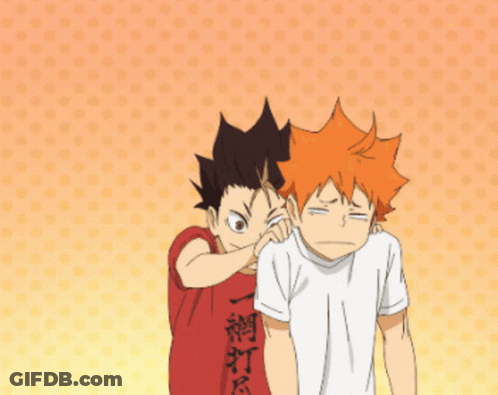 A Boy In A Red Shirt Is Putting His Hand On Another Boy 'S Face GIF