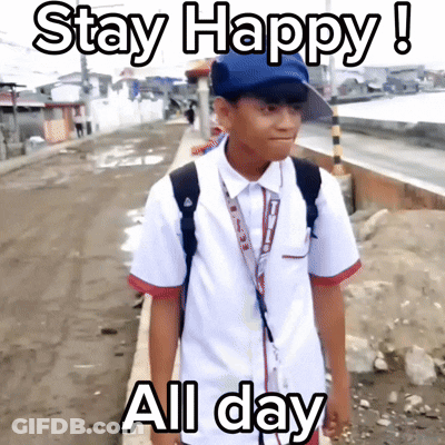A Boy In A School Uniform Is Standing On A Sidewalk With The Words Stay Happy All Day Written Above Him GIF
