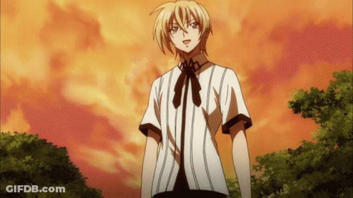 A Boy In A Striped Shirt With A Bow Tie Stands In Front Of A Cloudy Sky GIF