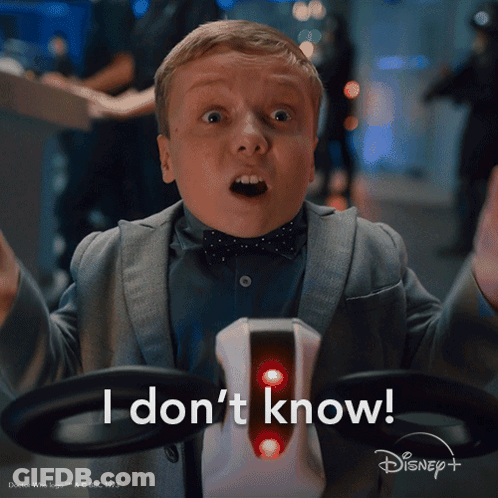 A Boy In A Suit And Bow Tie Says I Don T Know GIF