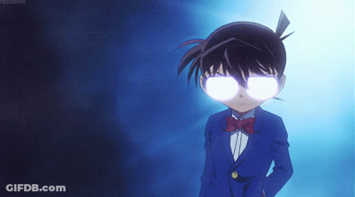 A Boy In A Suit And Bow Tie With Glowing Eyes GIF