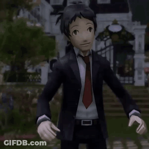 A Boy In A Suit And Tie Is Making A Heart Shape With His Hands . GIF
