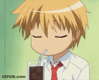 A Boy In A Tie Drinks Through A Straw GIF