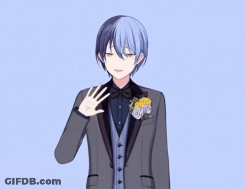 A Boy In A Tuxedo With Flowers In His Pocket Waving GIF