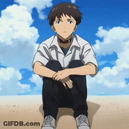 A Boy In A White Shirt Is Sitting On The Ground With His Legs Crossed GIF