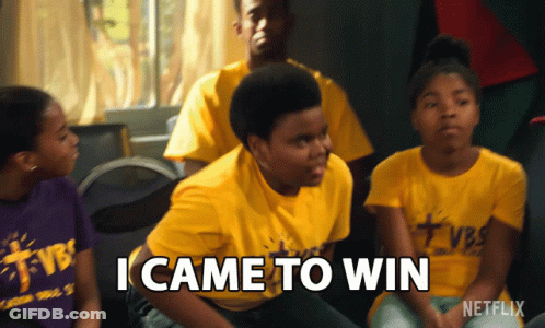 A Boy In A Yellow Shirt Says I Came To Win In Front Of A Group Of People GIF
