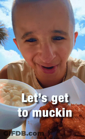 A Boy Is Holding A Bowl Of Macaroni And Cheese And A Plate Of Fried Chicken With The Caption Let 'S Get To Mucking GIF