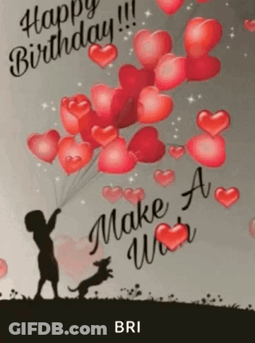 A Boy Is Holding A Bunch Of Balloons In The Shape Of Hearts . GIF