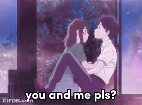 A Boy Is Holding A Girl In His Arms And The Girl Is Kissing The Boy On The Forehead . GIF