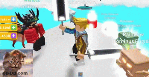A Boy Is Holding A Sword In A Video Game While Another Boy Is Holding A Hammer . GIF