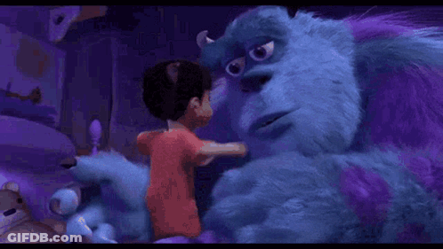 A Boy Is Hugging A Purple Monster From The Movie Monsters Inc . GIF