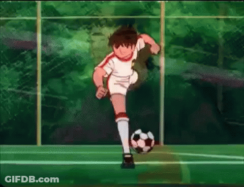 A Boy Is Kicking A Soccer Ball On A Field In A Cartoon . GIF