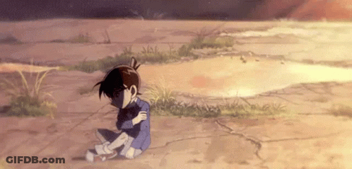 A Boy Is Sitting On The Ground With His Arms Around His Neck . GIF