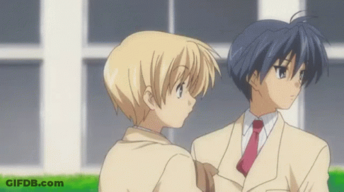 A Boy Is Throwing A Book In The Air While Another Boy Watches . GIF