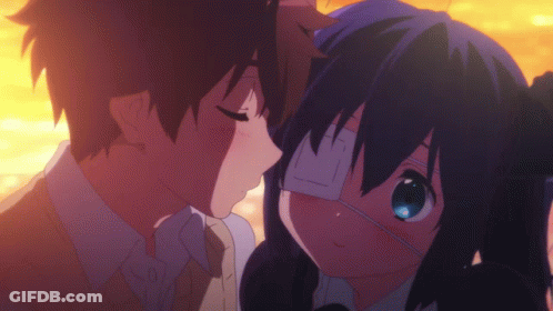 A Boy Kissing A Girl With An Eye Patch GIF