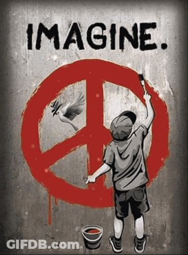 A Boy Paints A Peace Sign On A Wall With The Words Imagine Below It GIF