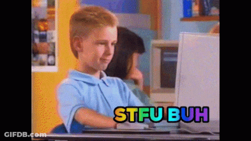 A Boy Sitting In Front Of A Computer With Stfubuh Written On The Screen Behind Him GIF