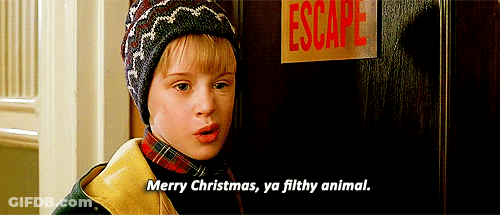 A Boy Standing In Front Of A Sign That Says " Escape " GIF