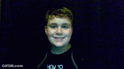 Boy In Black Shirt Holding Blue Toy Gun GIF